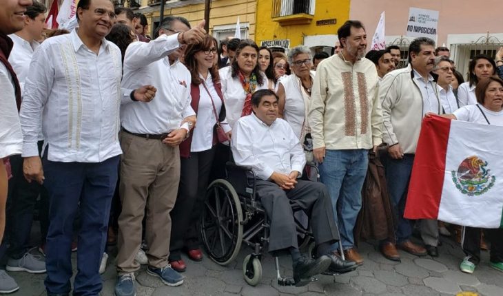 Marchan contra fraude en Puebla