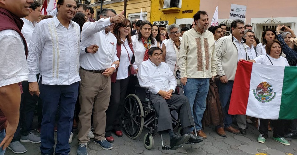 Marchan contra fraude en Puebla