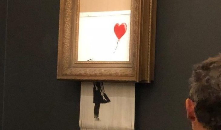 Una obra de Banksy se autodestruye tras ser subastada