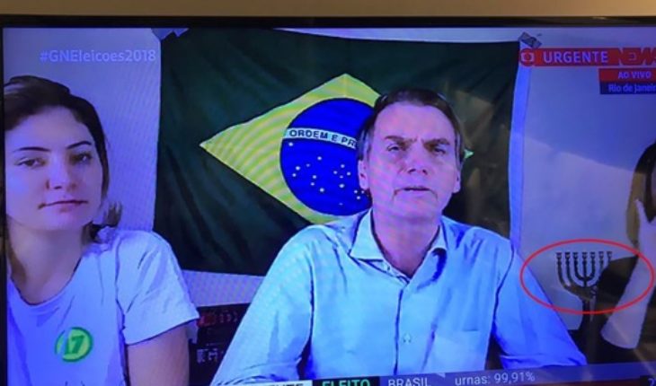 translated from Spanish: ¿Se fijó en la menorá detrás del próximo presidente de Brasil?