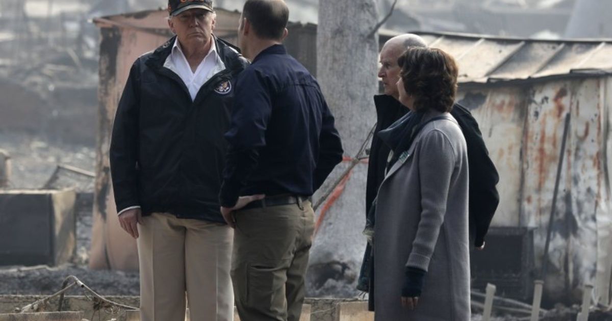 Trump visits area devastated by fire in California