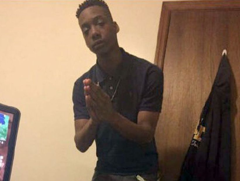 Teenager is shot dead after knocking on the door wrong in a building