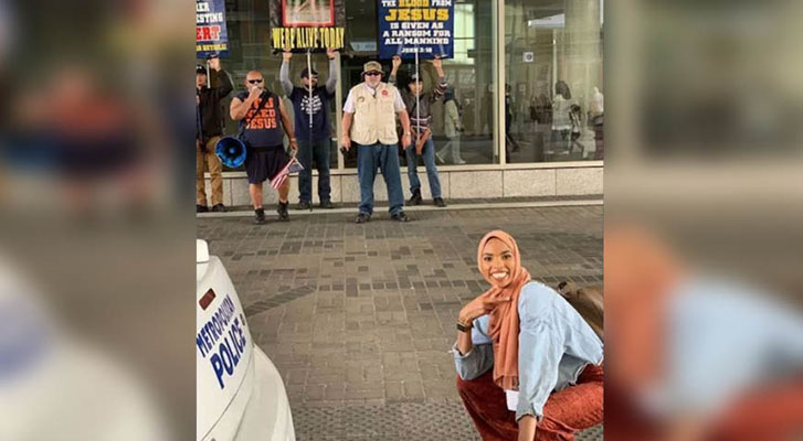 It becomes viral photo of Muslim woman smiling against intolerance, in United States