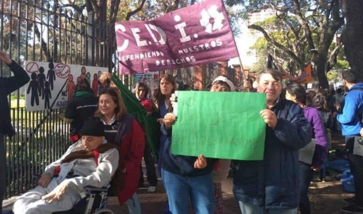 translated from Spanish: Protest against the fifth of olive trees against disability cuts