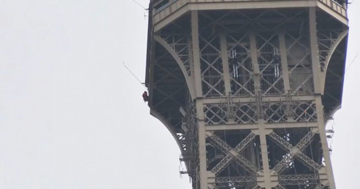 They close and evacuate the Eiffel tower by a man who tries to climb it