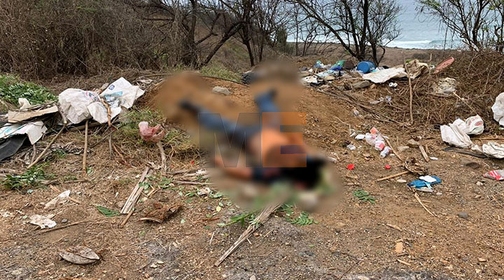 Body with bullet impacts is located on the road to Tecomán, Michoacán