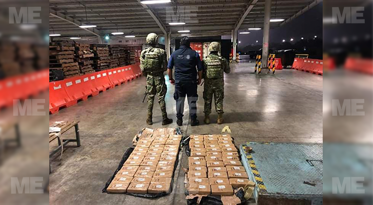 Marinos securing 70 packs of cocaine in Lazaro Cardenas