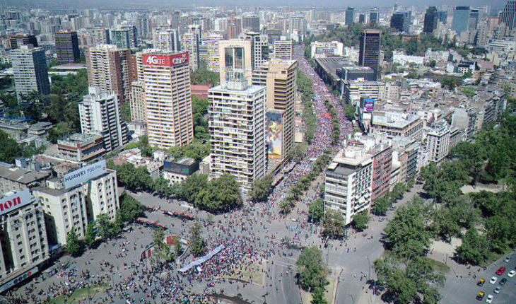 translated from Spanish: Massive demonstrations take place in Santiago