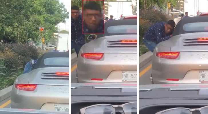 Thief assaults driver during red light (Video)