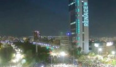 translated from Spanish: With the word “Renace” as a backdrop Plaza Baquedano transforms into a collective feast after crushing victory of the Apruebo
