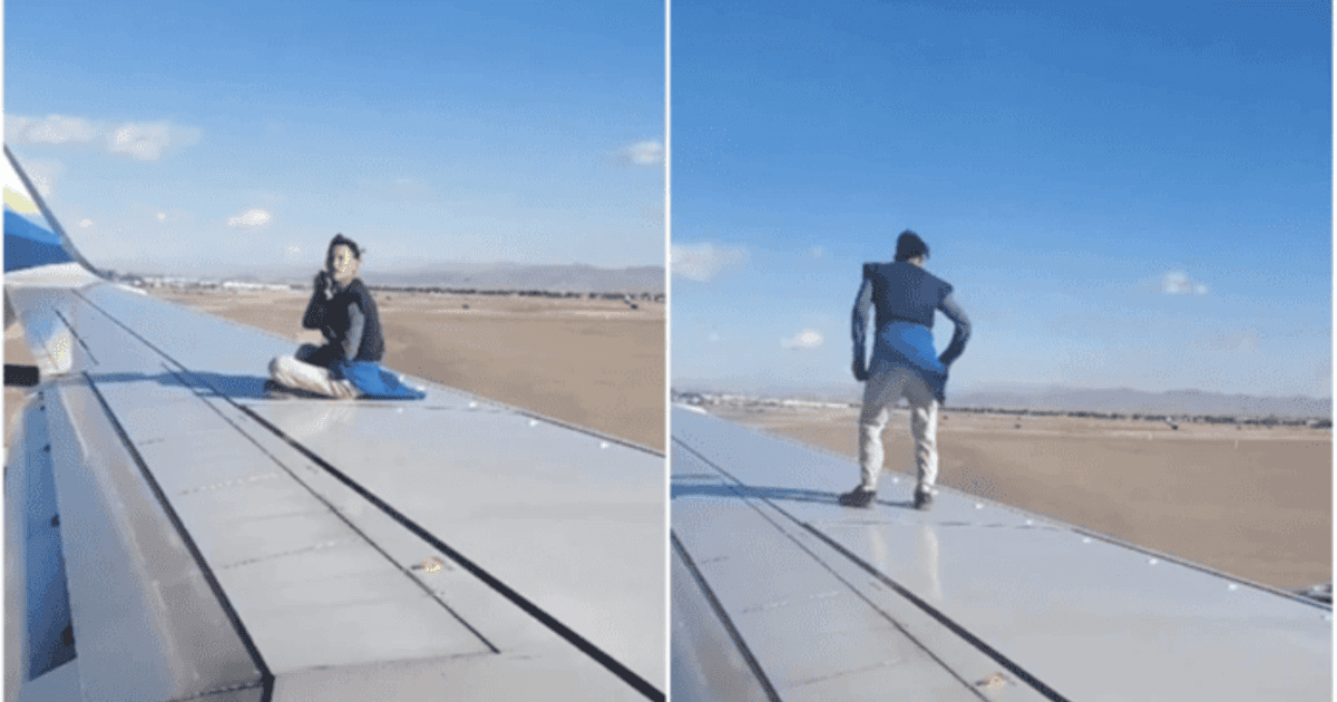 Un hombre se subió a el ala de un avión antes de despegar