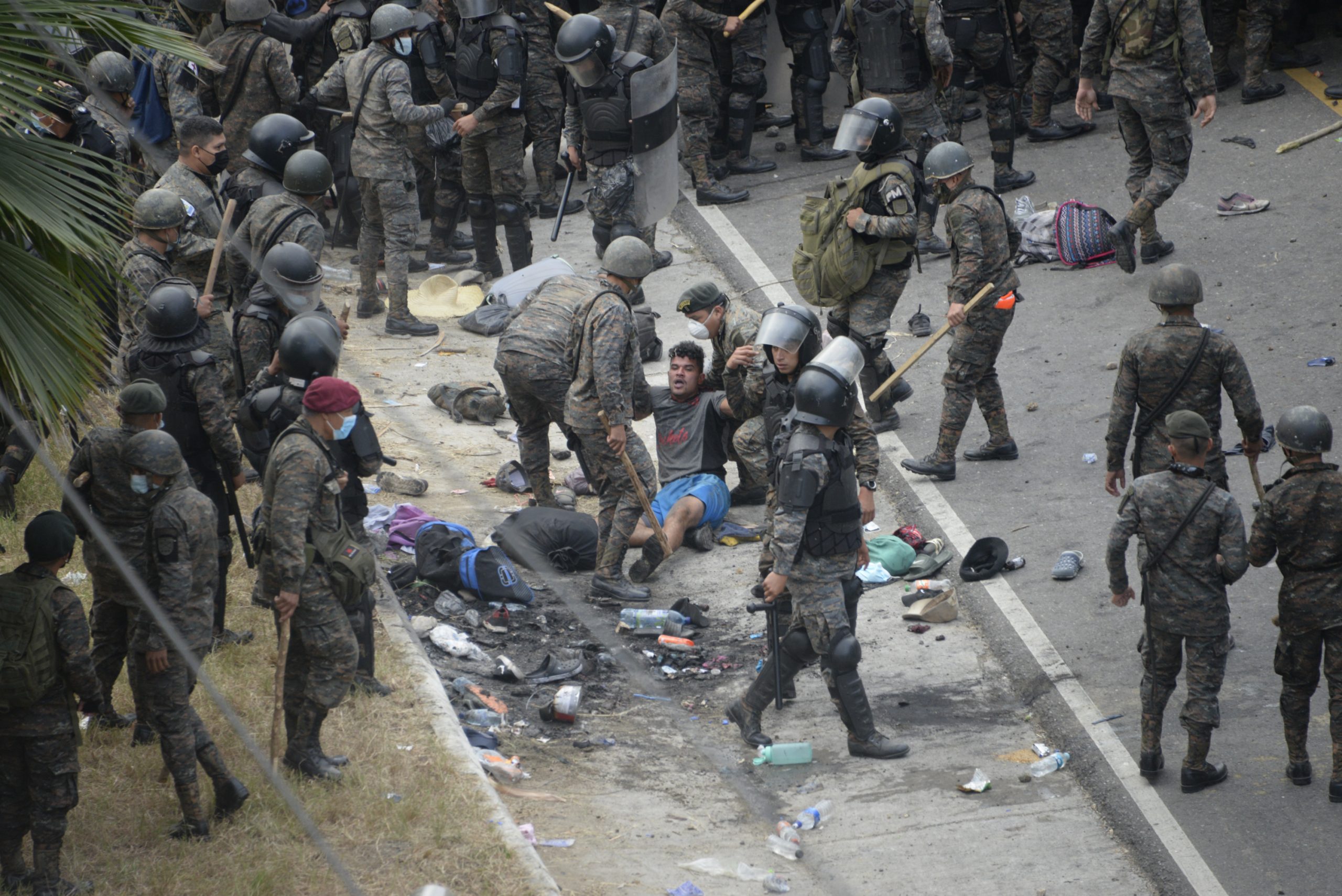 Guatemalan police stop migrant caravan with tear gas