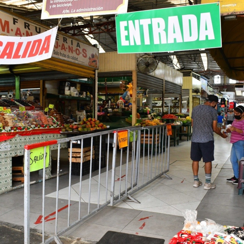 Remove protocol canvases at Suarez market in Mazatlan