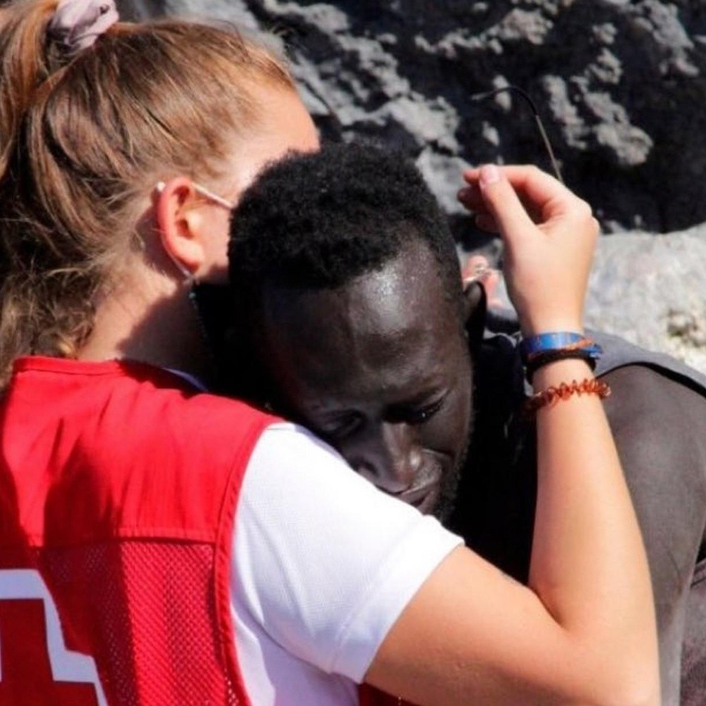 The embrace of a migrant with a lifeguard in Ceuta