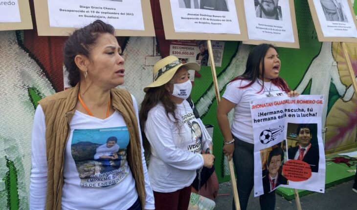 Families of disappeared protest during AMLO’s march