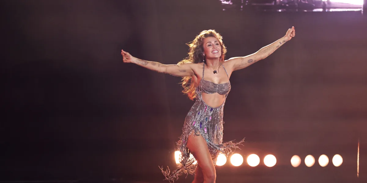 Miley Cyrus won her first Grammy and celebrated with a particular version of "Flowers"